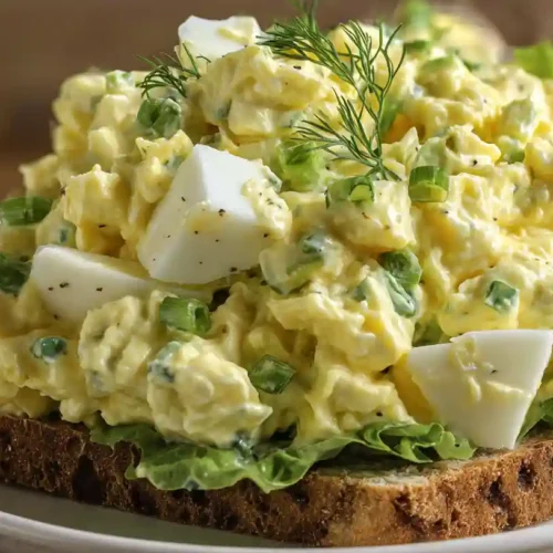 Appetizing egg salad sandwich on whole grain bread, showcasing a delicious egg salad recipe.